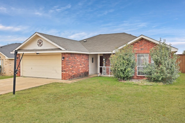 ranch-style house featuring a garage and a front lawn