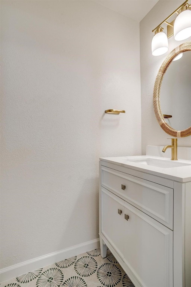 bathroom with vanity and tile patterned floors