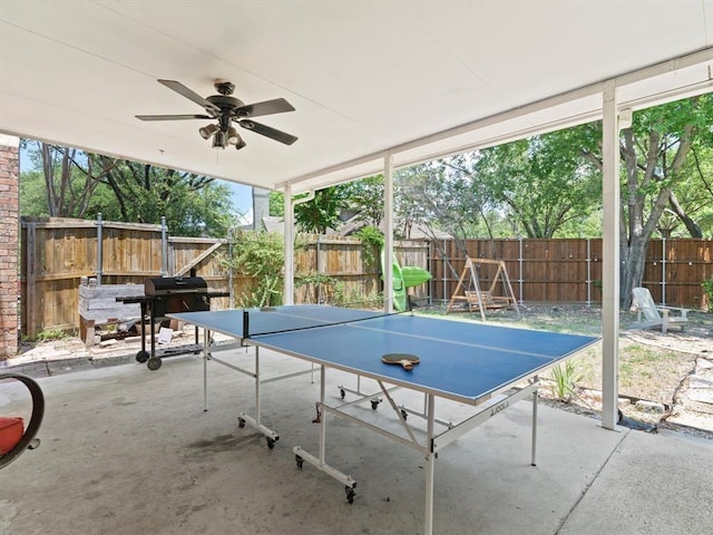 view of patio with ceiling fan and grilling area