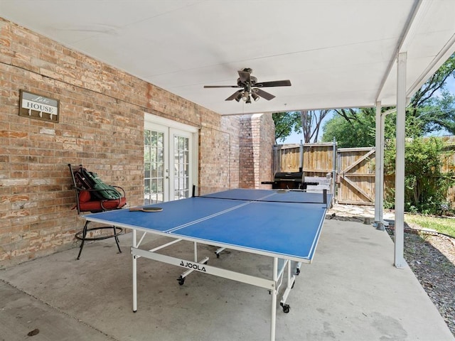 view of patio / terrace with french doors and ceiling fan