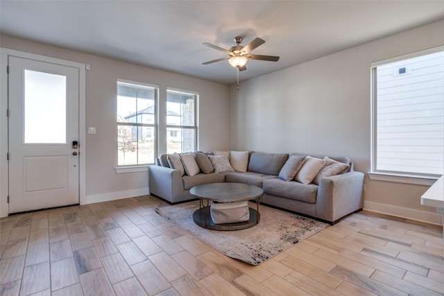 living room featuring ceiling fan