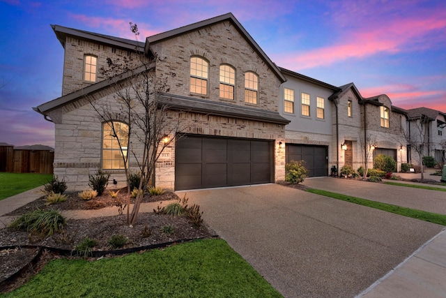 view of front of home with a garage