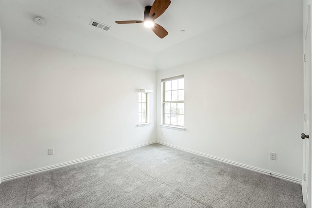 carpeted empty room with ceiling fan