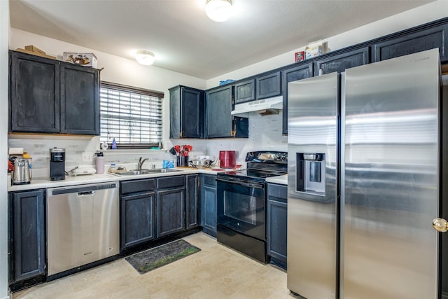 kitchen with stainless steel appliances, tasteful backsplash, and sink