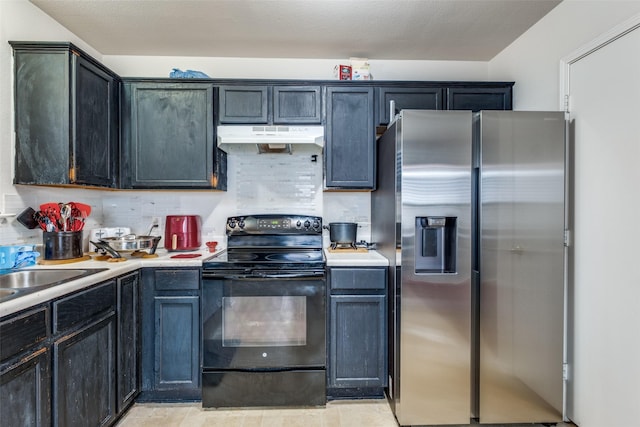 kitchen featuring sink, stainless steel fridge, backsplash, and black / electric stove