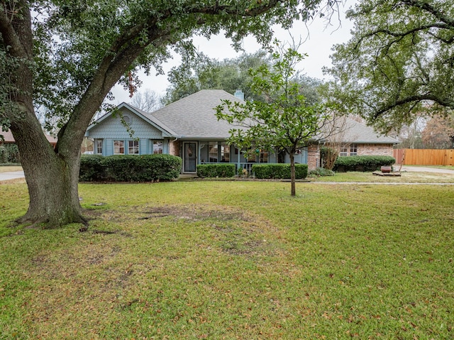 ranch-style house with a front yard