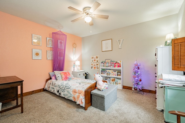 bedroom with ceiling fan and light colored carpet