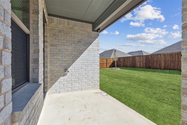 view of yard with a patio area