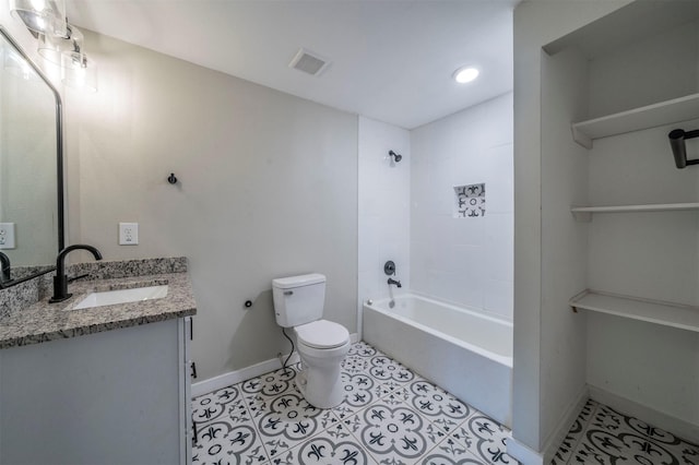 full bathroom featuring vanity, tiled shower / bath combo, tile patterned floors, and toilet