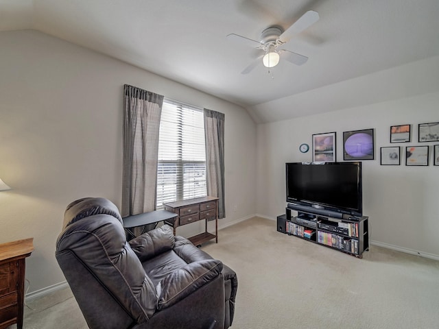 carpeted living room featuring lofted ceiling and ceiling fan