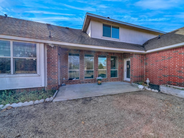 rear view of house featuring a patio area