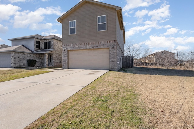 front of property featuring a garage and a front lawn