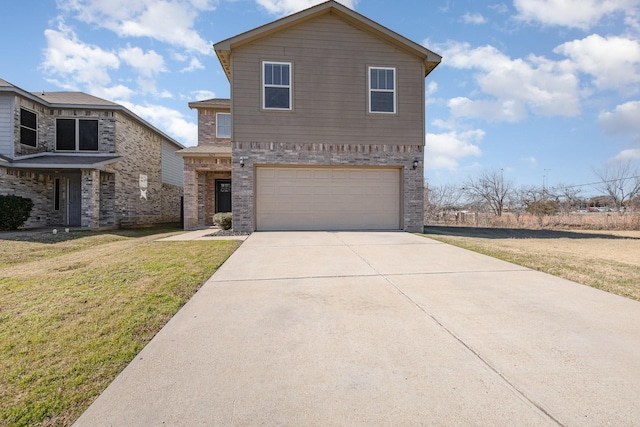 view of front property with a garage and a front yard