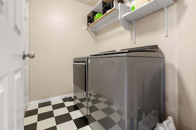 laundry room featuring washer and clothes dryer