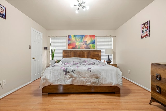 bedroom with light wood-type flooring