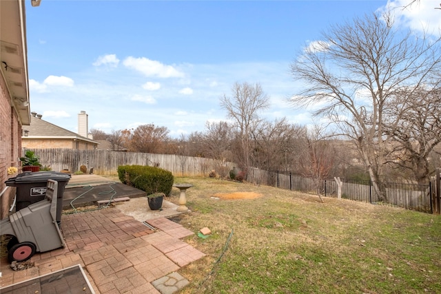 view of yard with a patio area