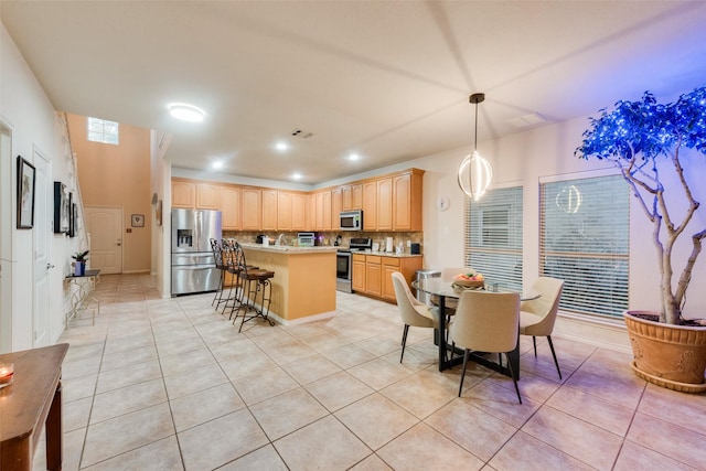 dining room featuring light tile patterned flooring