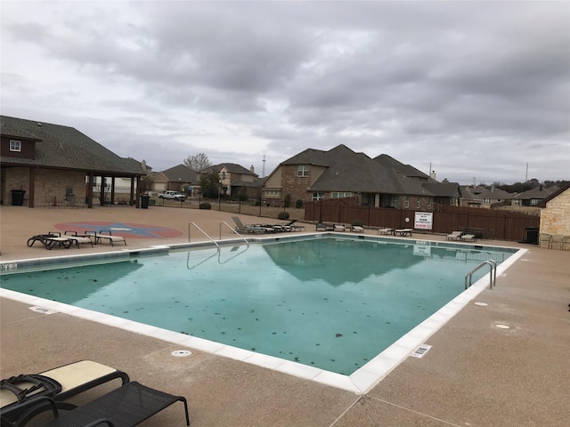 view of pool featuring a patio