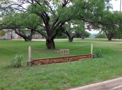 view of community with a lawn