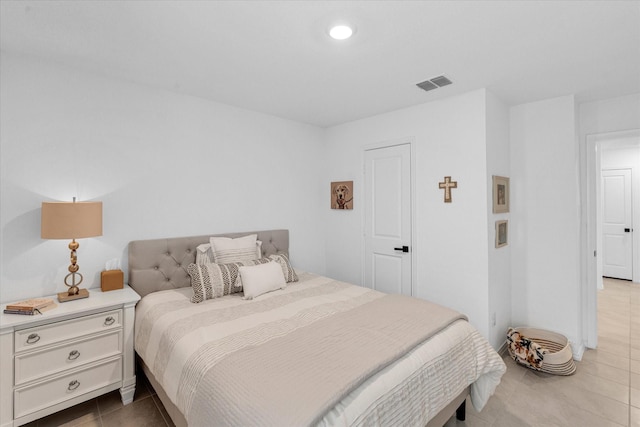 tiled bedroom featuring recessed lighting and visible vents