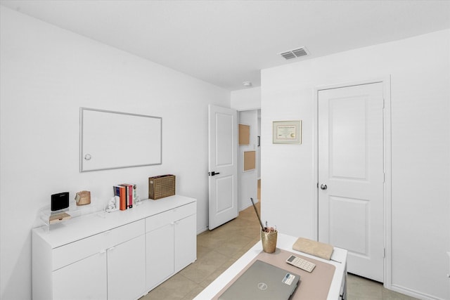 interior space featuring light tile patterned flooring