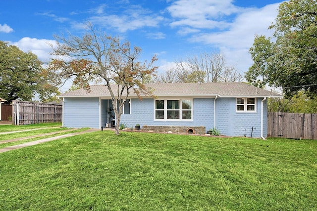 view of front of property with a front lawn