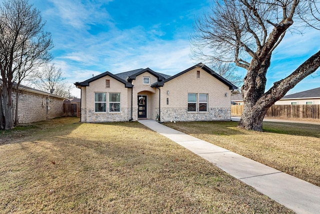 view of front of property with a front lawn