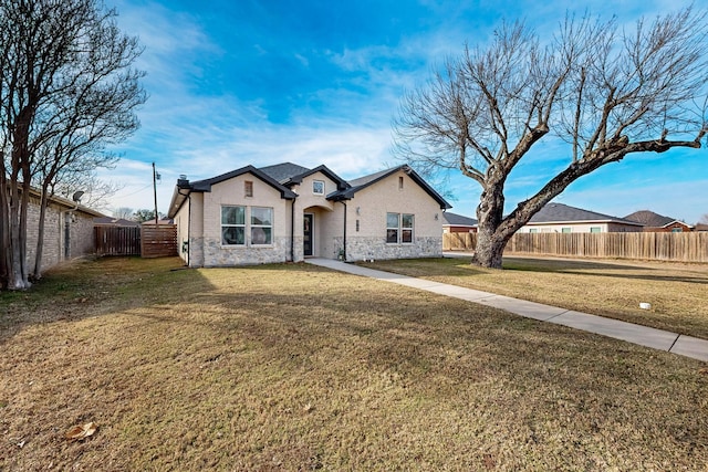 view of front of house with a front lawn