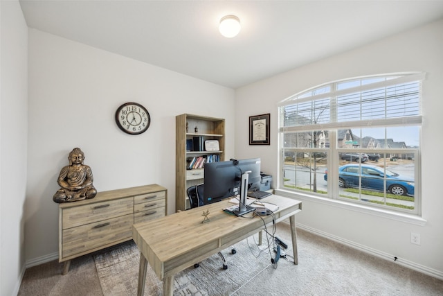 view of carpeted office space