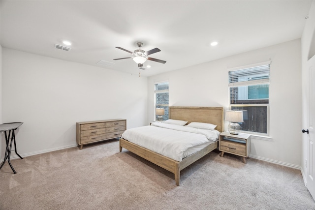 carpeted bedroom with ceiling fan