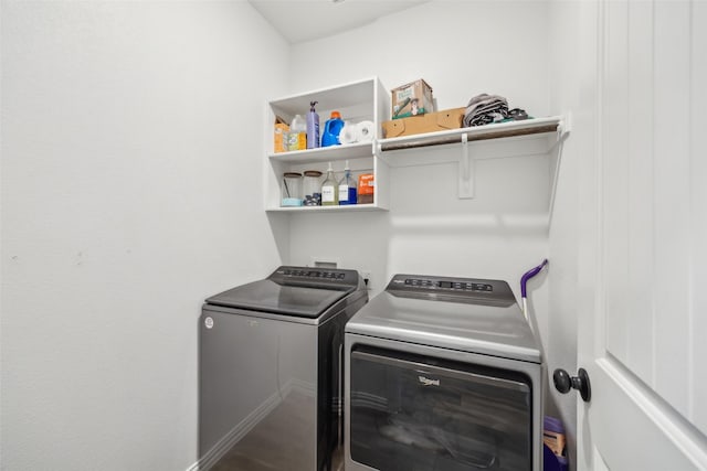 laundry area featuring independent washer and dryer