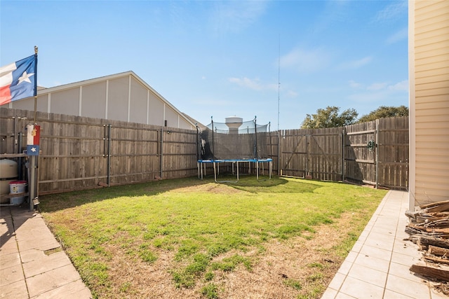 view of yard featuring a trampoline