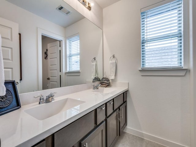 bathroom featuring vanity and tile patterned floors