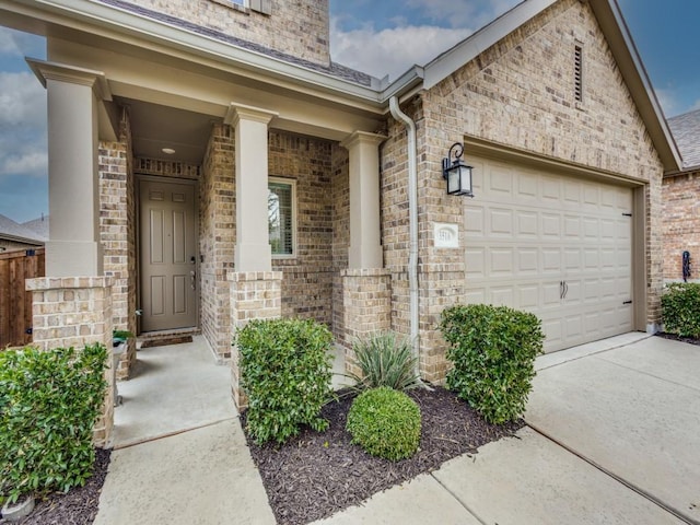 entrance to property featuring a garage