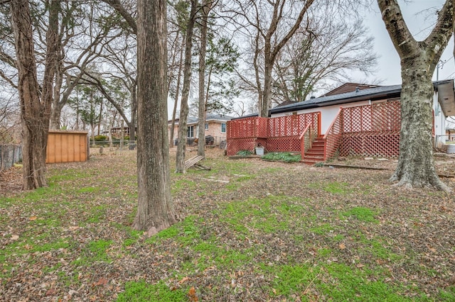 view of yard featuring a deck