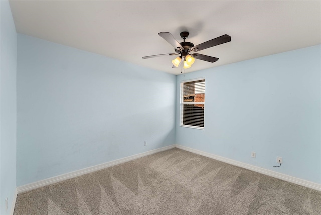 empty room with carpet floors and ceiling fan