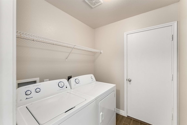 laundry area with washer and dryer