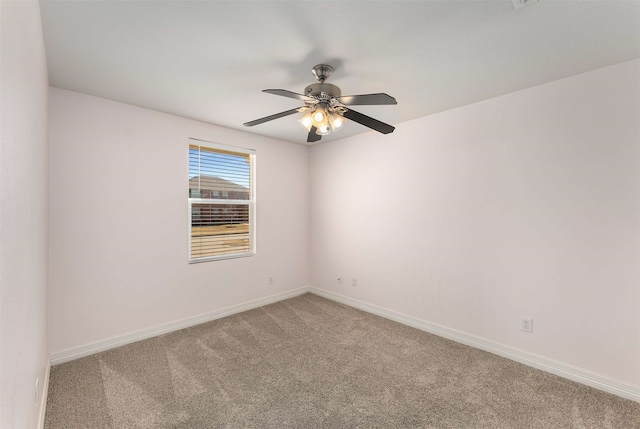 unfurnished room featuring carpet flooring and ceiling fan