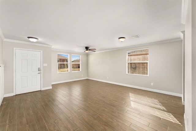 interior space with dark hardwood / wood-style flooring, ornamental molding, and ceiling fan