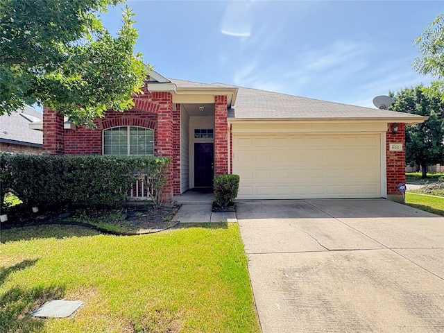 800 Warbler, Aubrey, TX 76227 - view of front of house featuring brick siding, a garage, concrete driveway, and a front yard