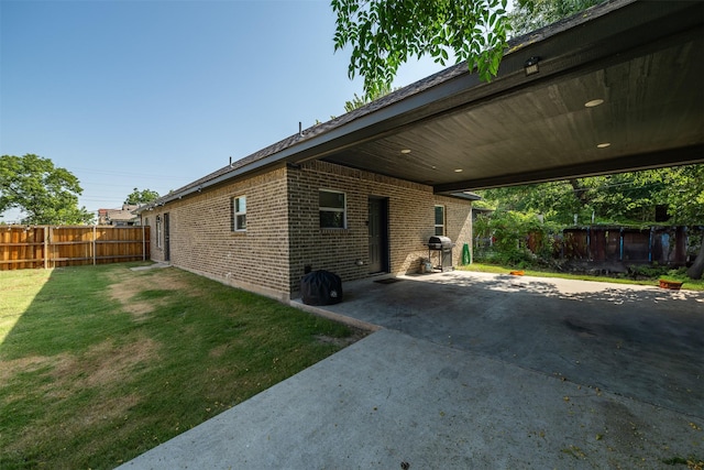 view of home's exterior featuring a yard