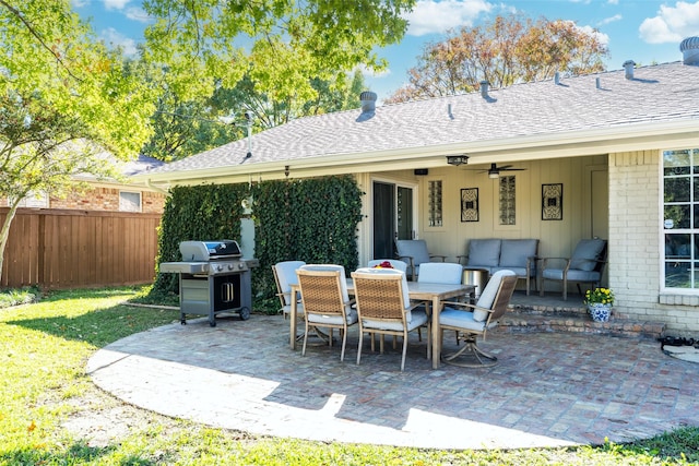 view of patio / terrace with area for grilling, an outdoor hangout area, and ceiling fan