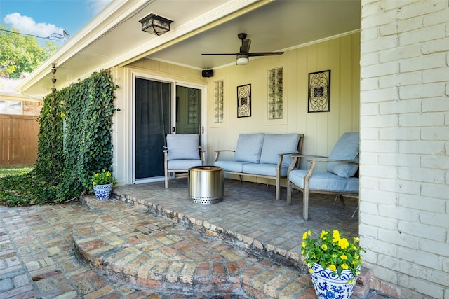 view of patio featuring outdoor lounge area and ceiling fan