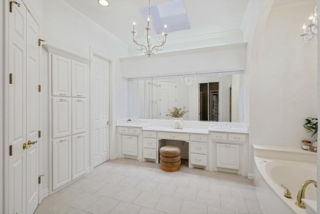 full bath with a garden tub, a closet, ornamental molding, vanity, and a chandelier