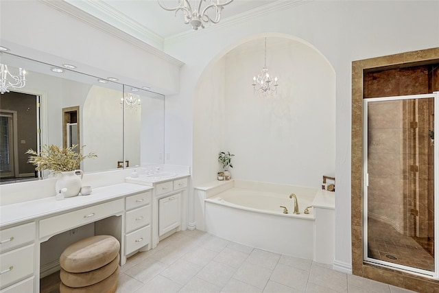 bathroom with vanity, a notable chandelier, ornamental molding, tile patterned floors, and separate shower and tub