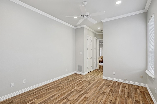 unfurnished bedroom featuring recessed lighting, visible vents, ornamental molding, light wood-type flooring, and baseboards