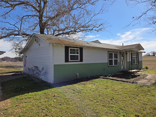 exterior space with a yard