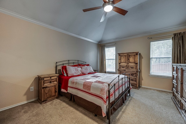 carpeted bedroom with crown molding, lofted ceiling, and ceiling fan