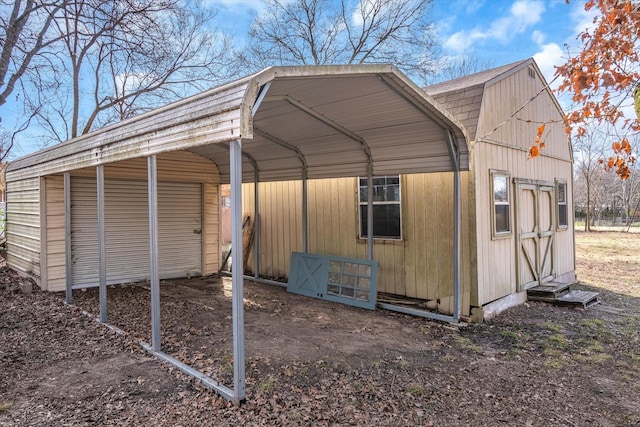 view of outdoor structure with a carport