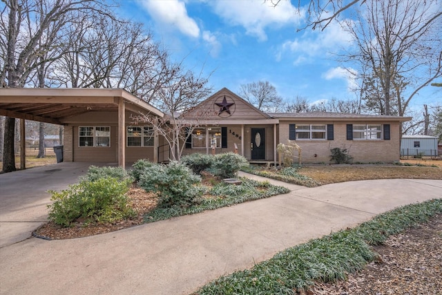 view of front facade with a carport